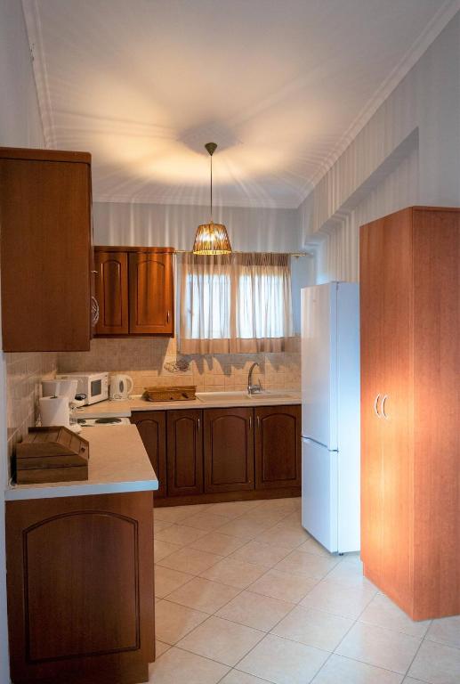 Kuchyň nebo kuchyňský kout v ubytování Elenas Villas