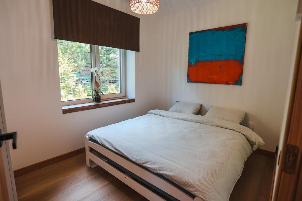 Postel nebo postele na pokoji v ubytování Home Stay Juniper