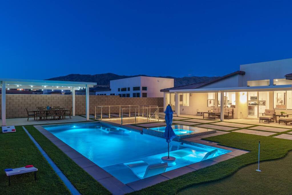 Photo inspiration: Fresh Look at Chilled Salt Pool Luxury Firepit Mini Golfing Desert Hot Springs