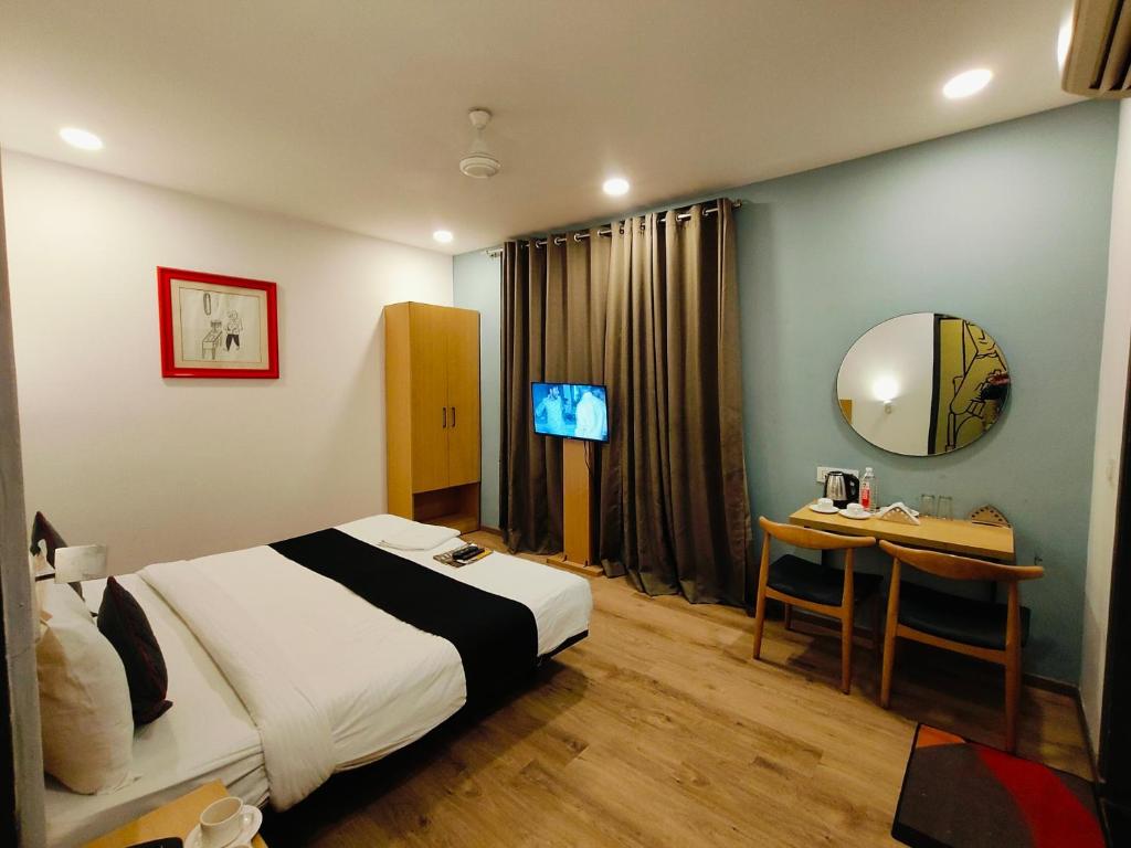 Postel nebo postele na pokoji v ubytování Hotel La Maison