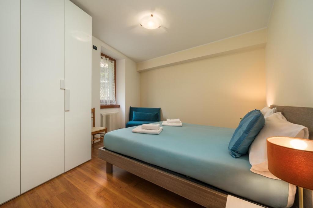 Postel nebo postele na pokoji v ubytování Casa Monica Ledro Family