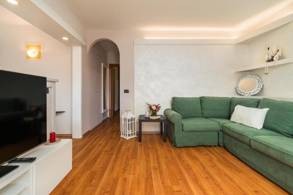 TV a/nebo společenská místnost v ubytování Casa Monica Ledro Family