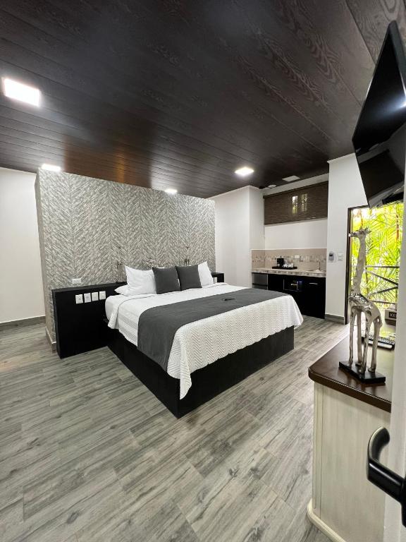 Postel nebo postele na pokoji v ubytování Hotel Boutique Casa Del Rio