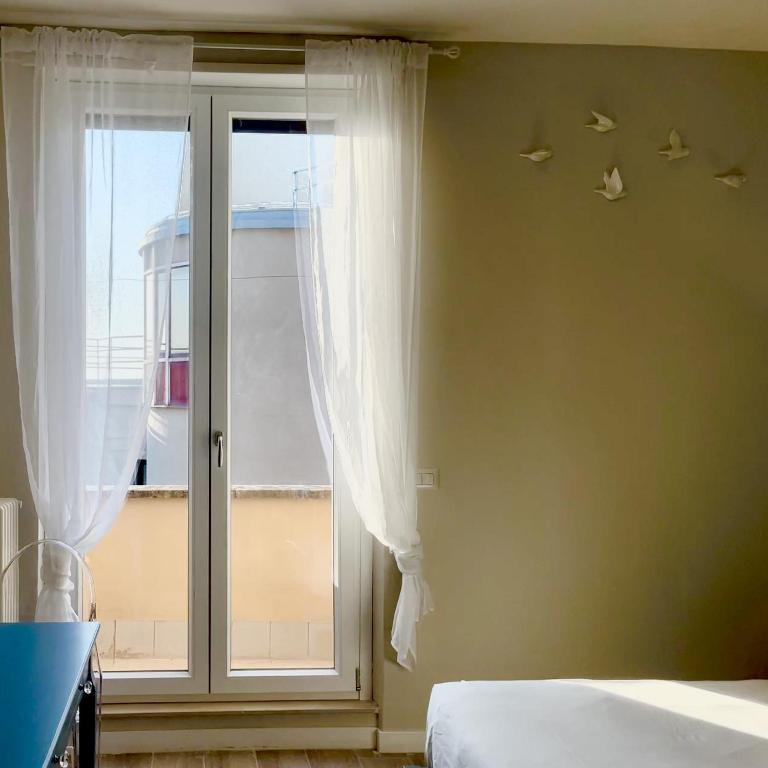Postel nebo postele na pokoji v ubytování Elements