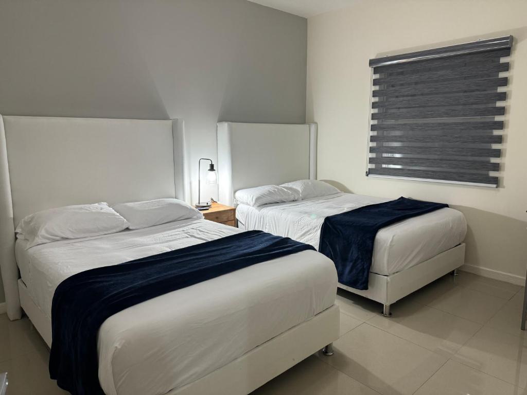 Postel nebo postele na pokoji v ubytování Depas & suites TOSVA
