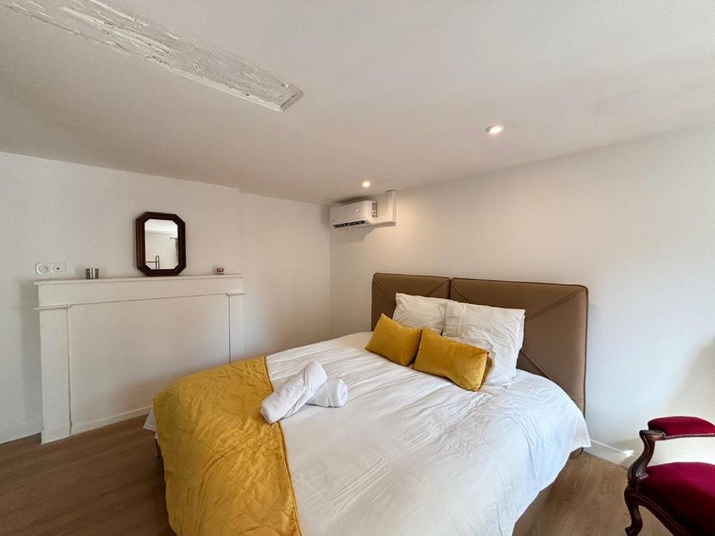 Voodi või voodid majutusasutuse Maison à 5 min du Harras du pin toas