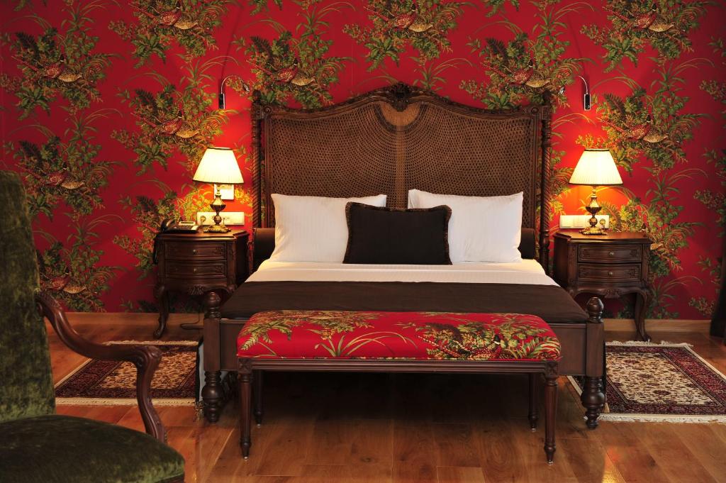 Postel nebo postele na pokoji v ubytování Villa Augusto Boutique Hotel & SPA