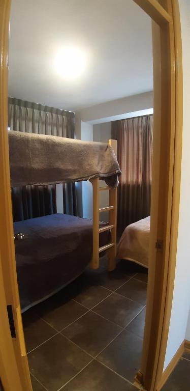 Postel nebo postele na pokoji v ubytování Urpi Wasi Backpackers