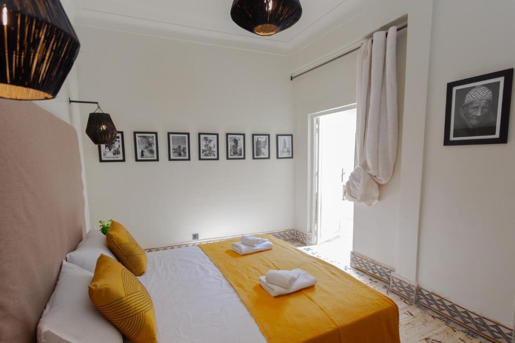 Postel nebo postele na pokoji v ubytování Riad Tawja