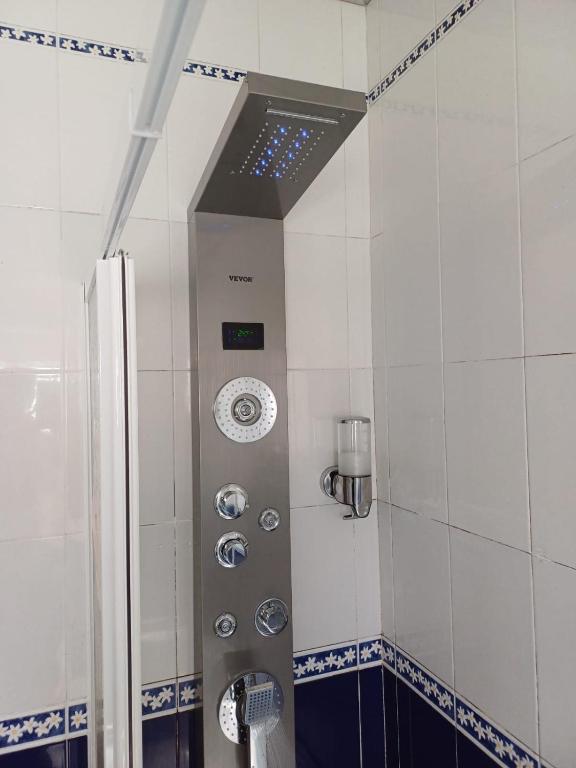 a shower in a bathroom with a shower at Hostel Nature in Zambujeira do Mar