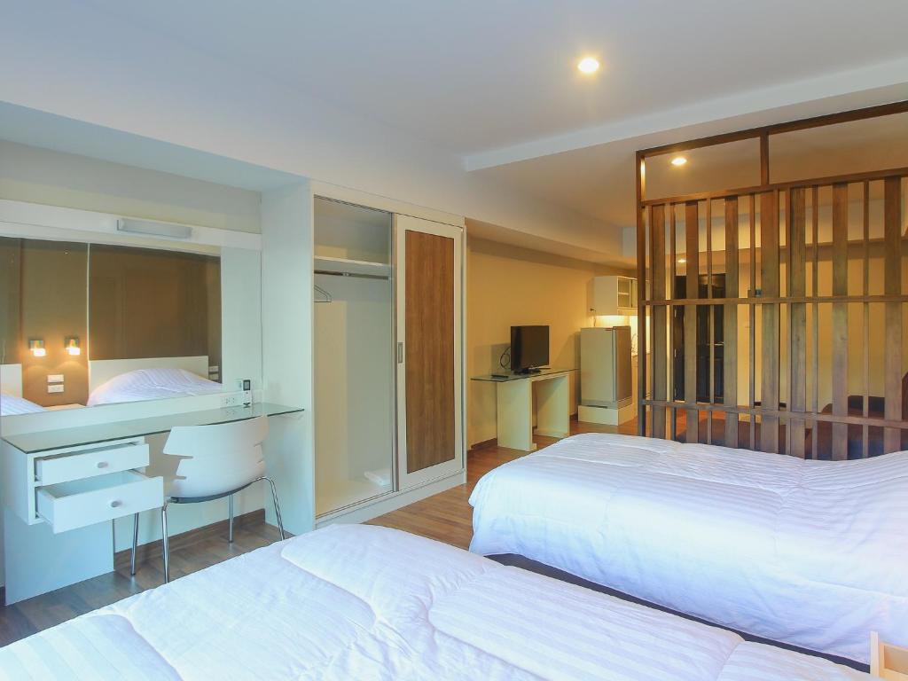 Postel nebo postele na pokoji v ubytování Huahin City View