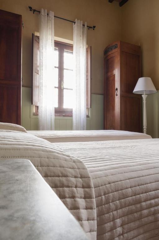 Postel nebo postele na pokoji v ubytování Villa Canavetro