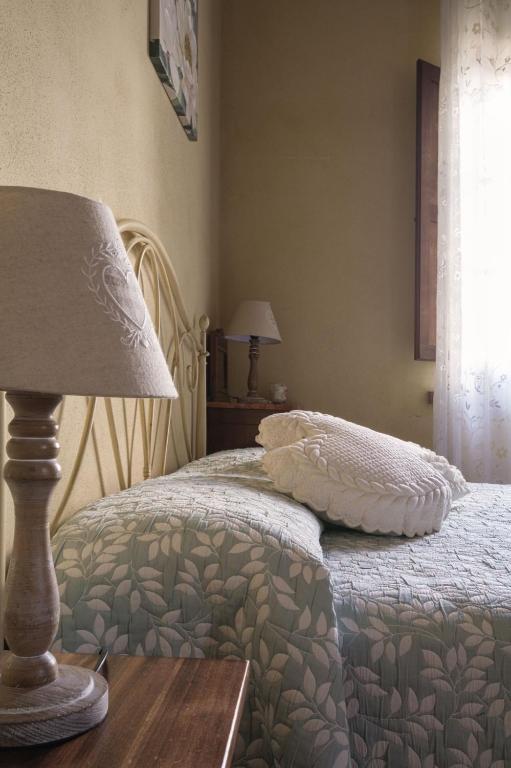 Postel nebo postele na pokoji v ubytování Villa Canavetro