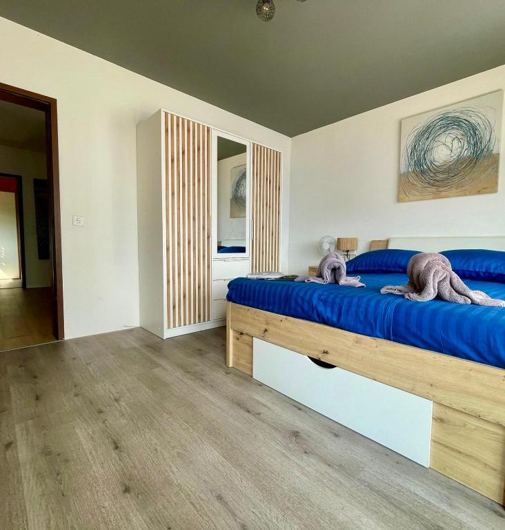 Uma cama ou camas num quarto em Casa Belvedere