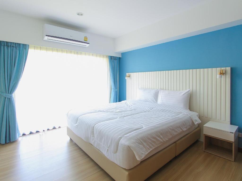 Postel nebo postele na pokoji v ubytování Huahin City View