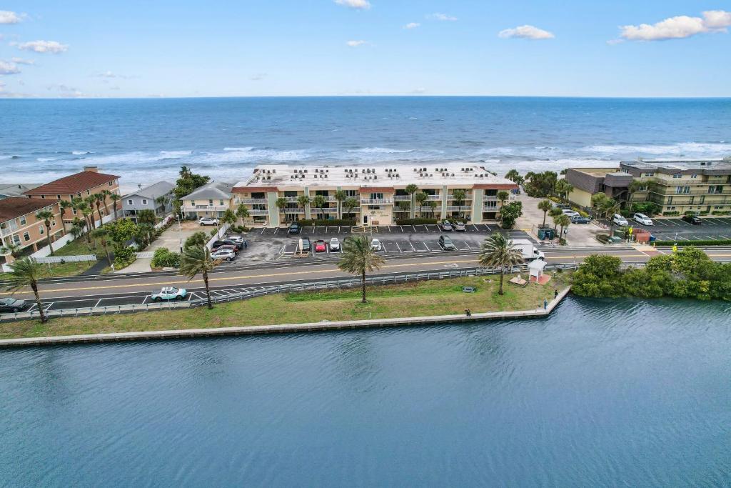an aerial view of a resort next to the ocean at Fifty Gulfside Condominiums in Clearwater Beach