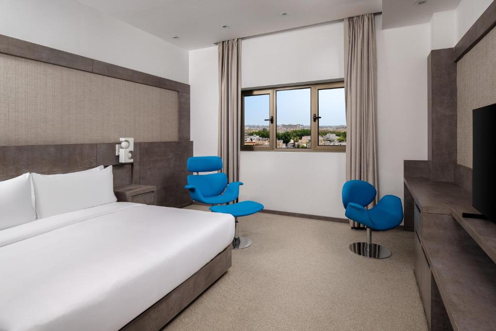 Carlton Al Moaibed Hotel - Deluxe Kamer Met Kingsize Bed