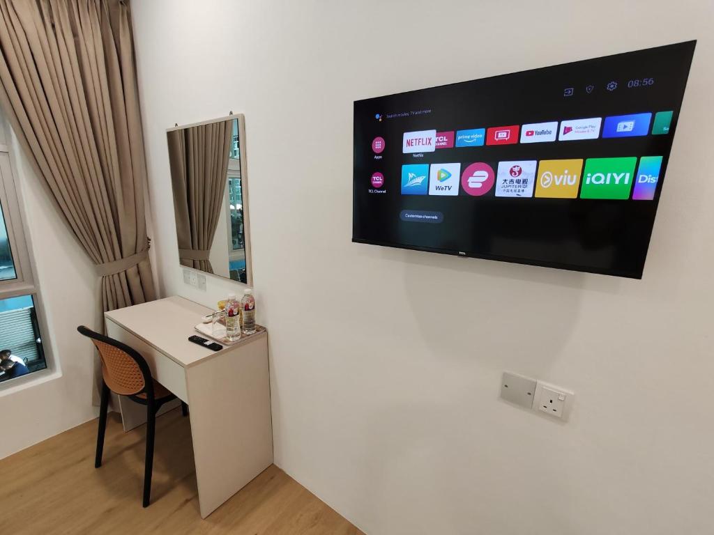 TV a/nebo společenská místnost v ubytování Lawson Inn