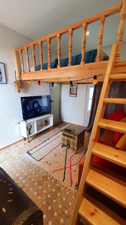 TV a/nebo společenská místnost v ubytování Riad mazighen