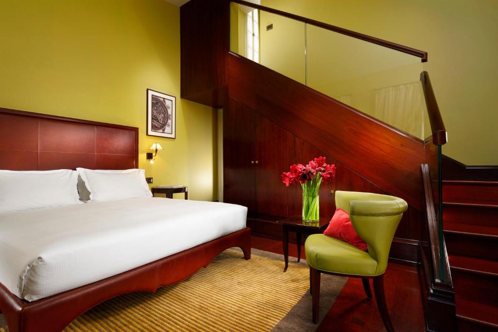 Postel nebo postele na pokoji v ubytování Hotel L'Orologio Firenze - WTB Hotels