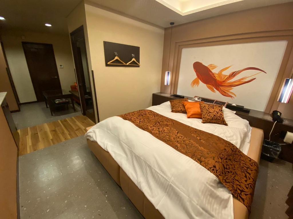 Postel nebo postele na pokoji v ubytování ホテル郷GO男塾ホテルグループAdult Only