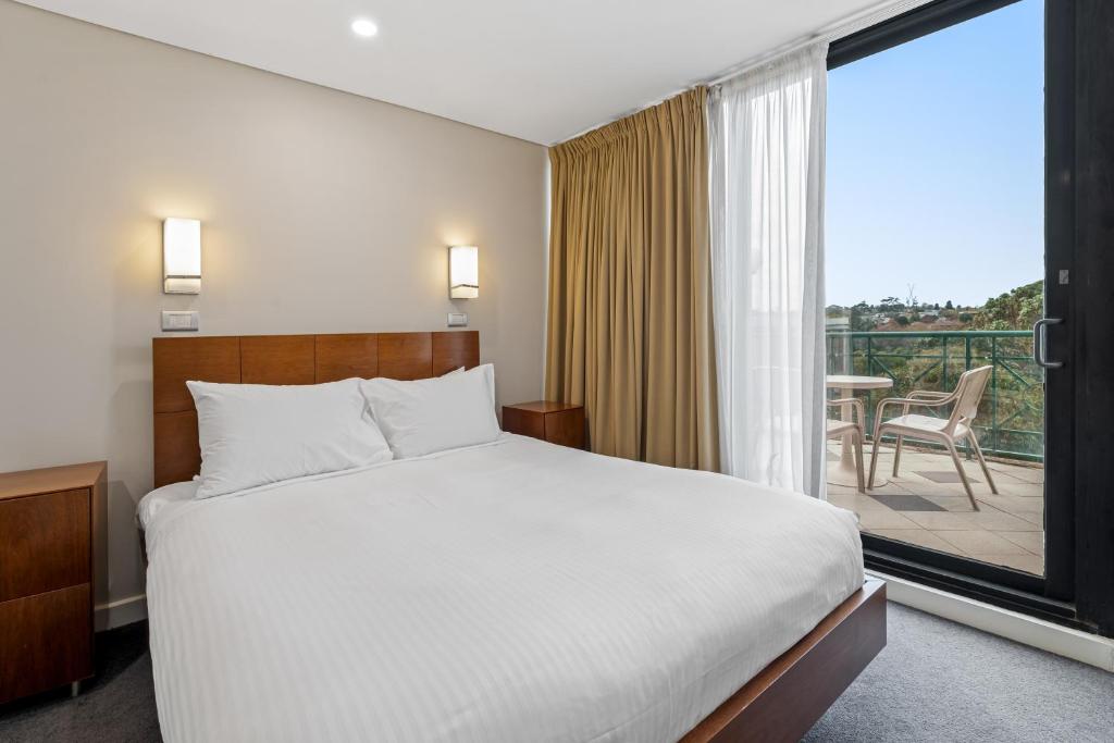 Postel nebo postele na pokoji v ubytování Amora Hotel Riverwalk Melbourne