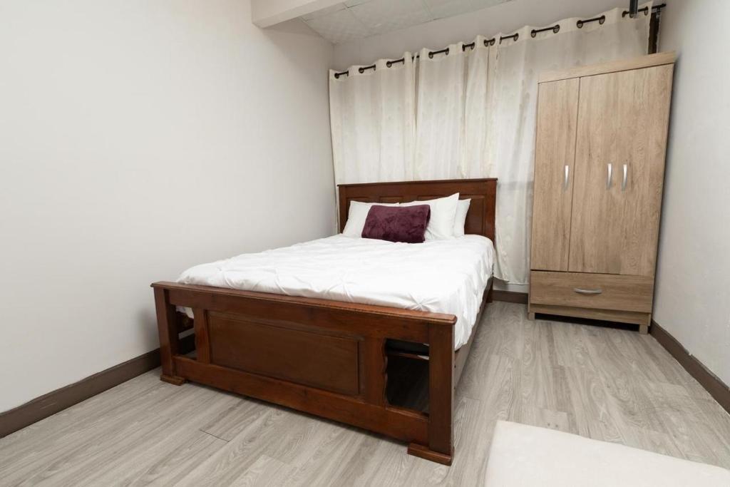 Postel nebo postele na pokoji v ubytování D'Rosas Apartments