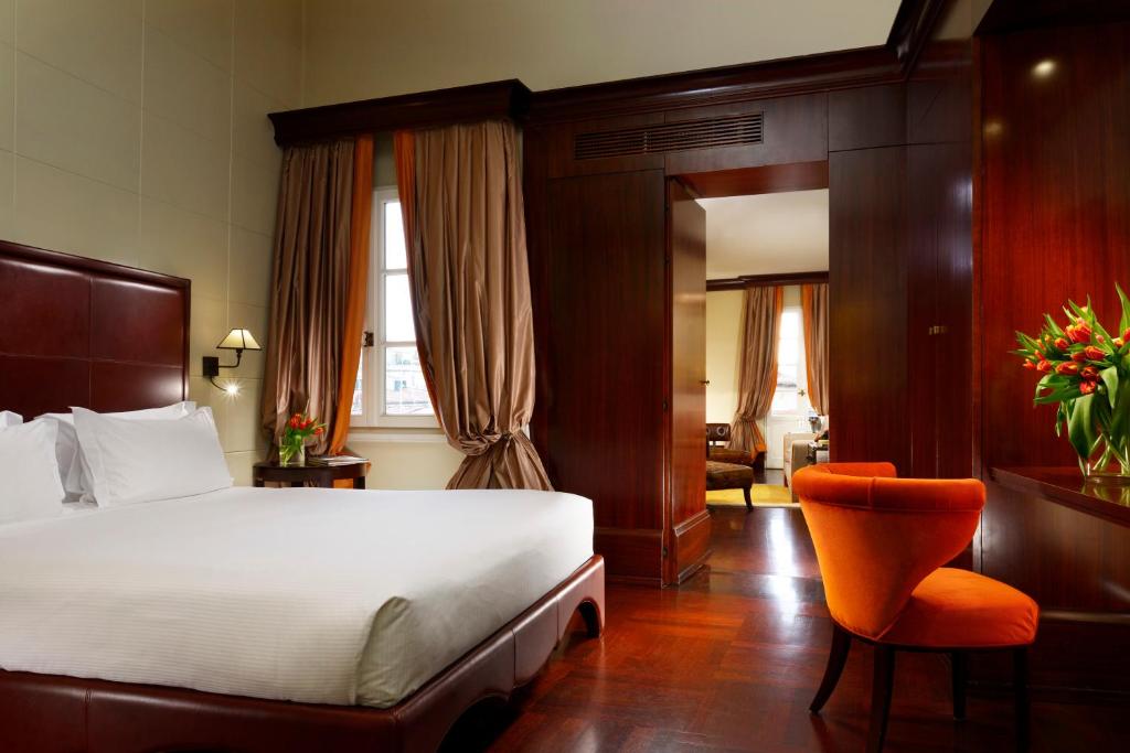 Postel nebo postele na pokoji v ubytování Hotel L'Orologio Firenze - WTB Hotels