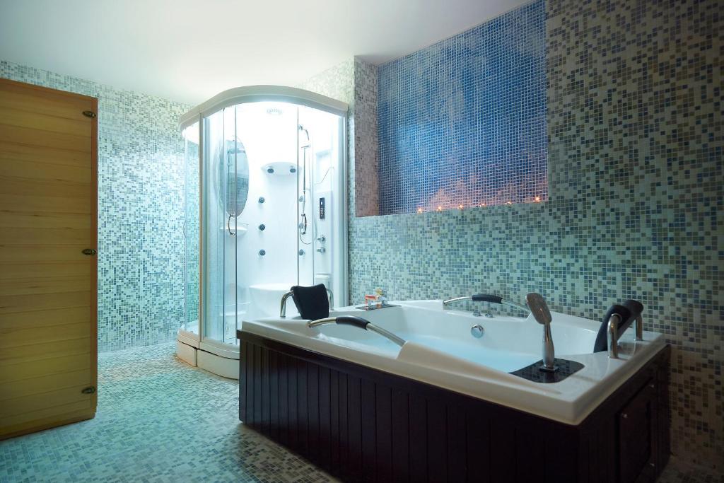 Koupelna v ubytování Arion Hotel