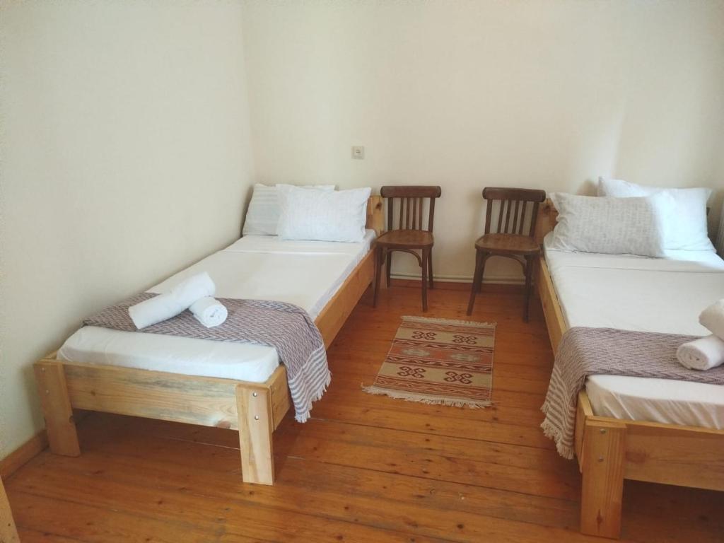 Postel nebo postele na pokoji v ubytování Gremeli Wine & Hotel