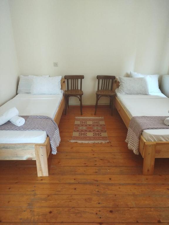 Postel nebo postele na pokoji v ubytování Gremeli Wine & Hotel