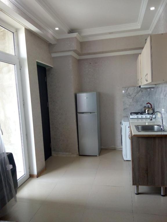 Kuchyň nebo kuchyňský kout v ubytování Gldani-house