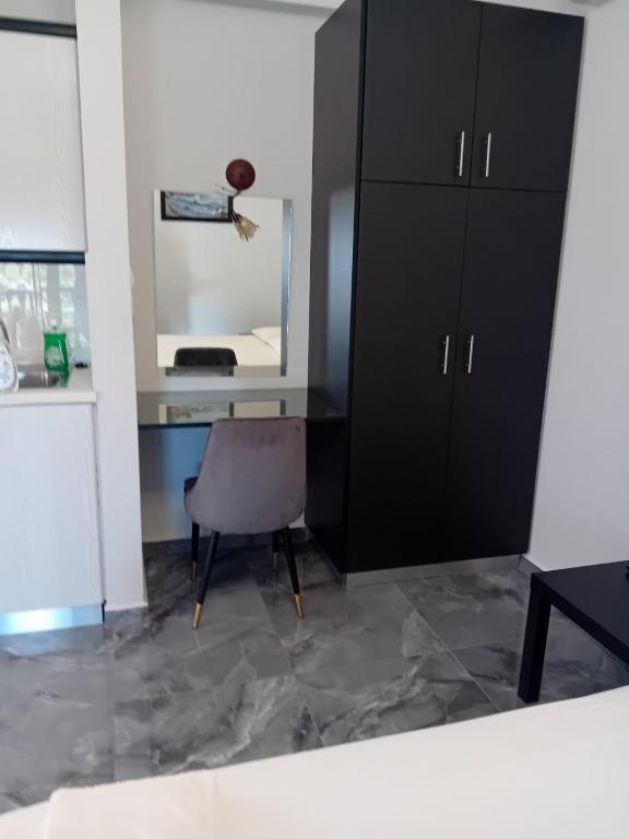 Kuchyň nebo kuchyňský kout v ubytování Eleni's Studios