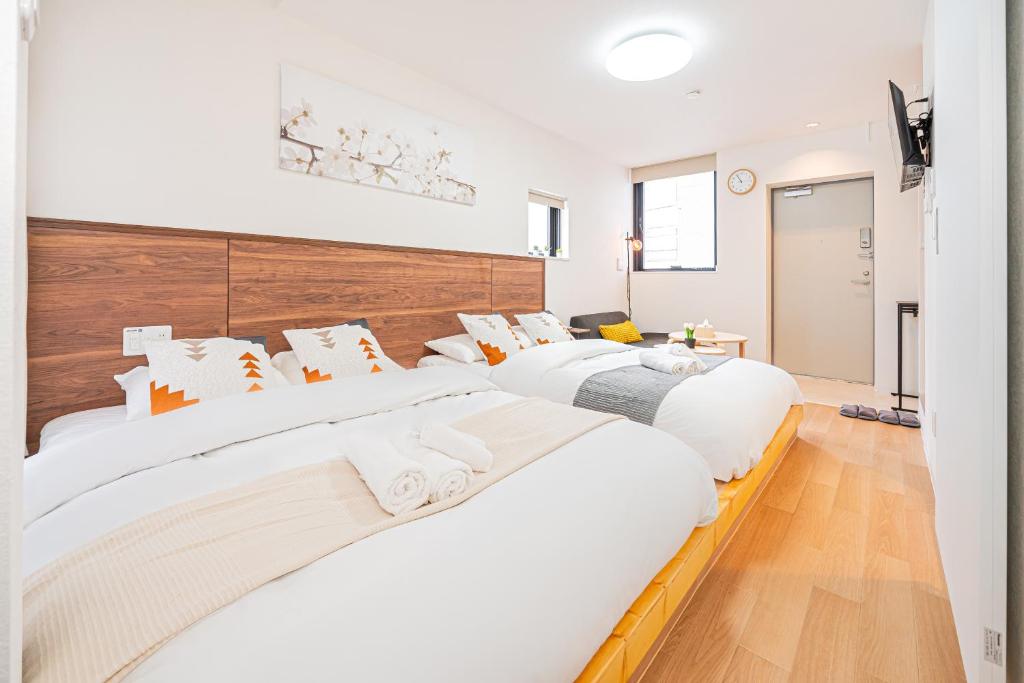 New Cozy APT Located on the Japanese Local shopping streetにあるベッド