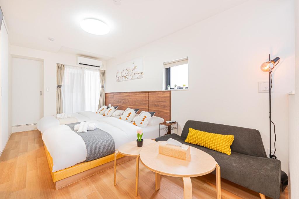 New Cozy APT Located on the Japanese Local shopping streetにあるベッド