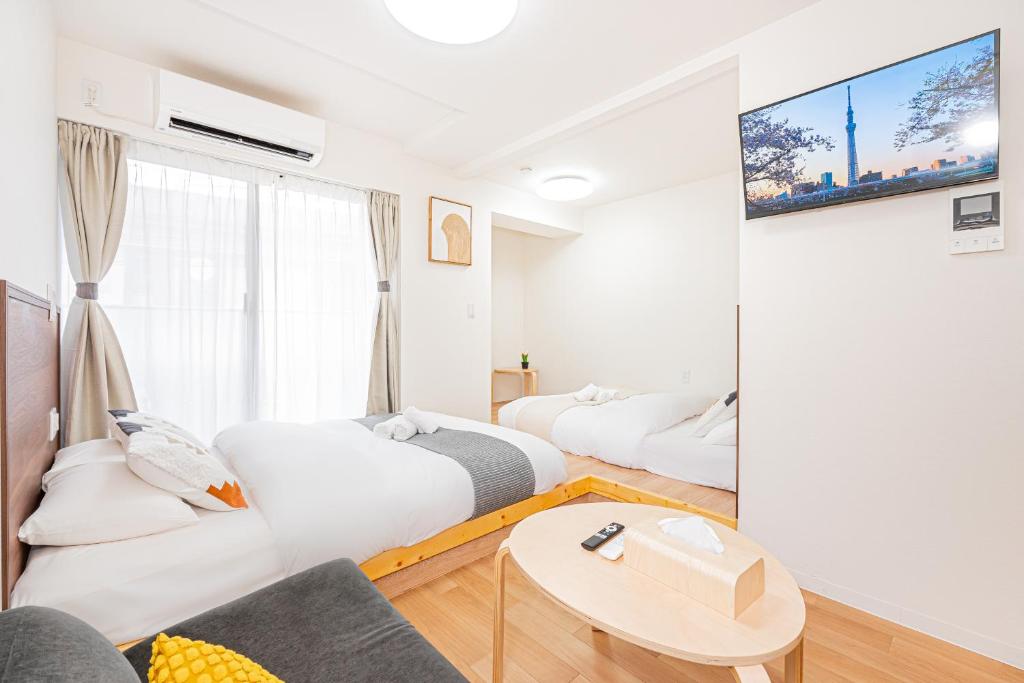 New Cozy APT Located on the Japanese Local shopping streetにあるベッド