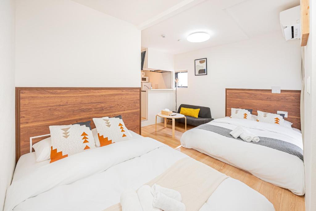New Cozy APT Located on the Japanese Local shopping streetにあるベッド