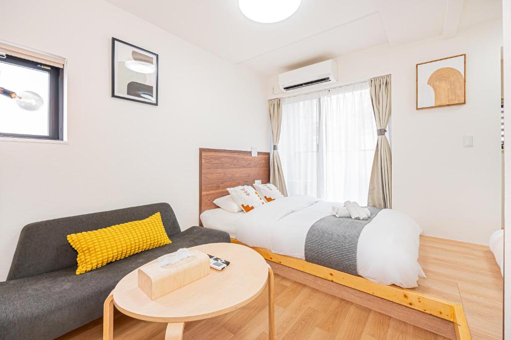 New Cozy APT Located on the Japanese Local shopping streetにあるベッド