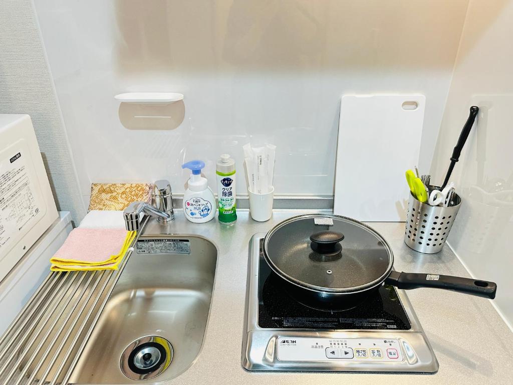 Kuchyň nebo kuchyňský kout v ubytování home鶴見橋