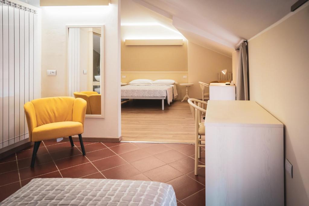 Postel nebo postele na pokoji v ubytování Al Vecchio Palazzo