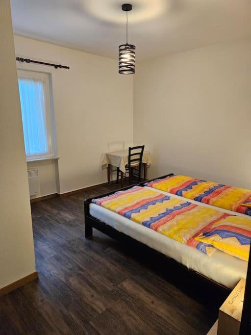 Postel nebo postele na pokoji v ubytování Appartamento confortevole