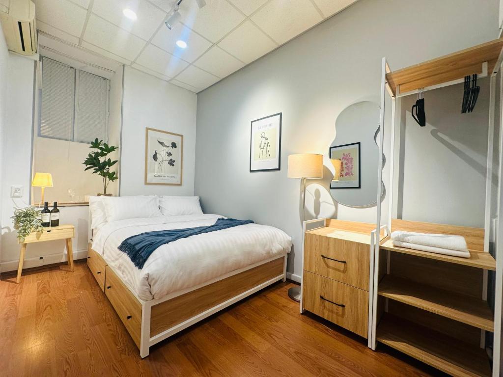 Postel nebo postele na pokoji v ubytování Cosy Koala Hostel