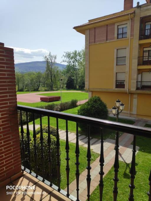 a view from a balcony of a building at La Campanilla de Cabárceno in Sarón