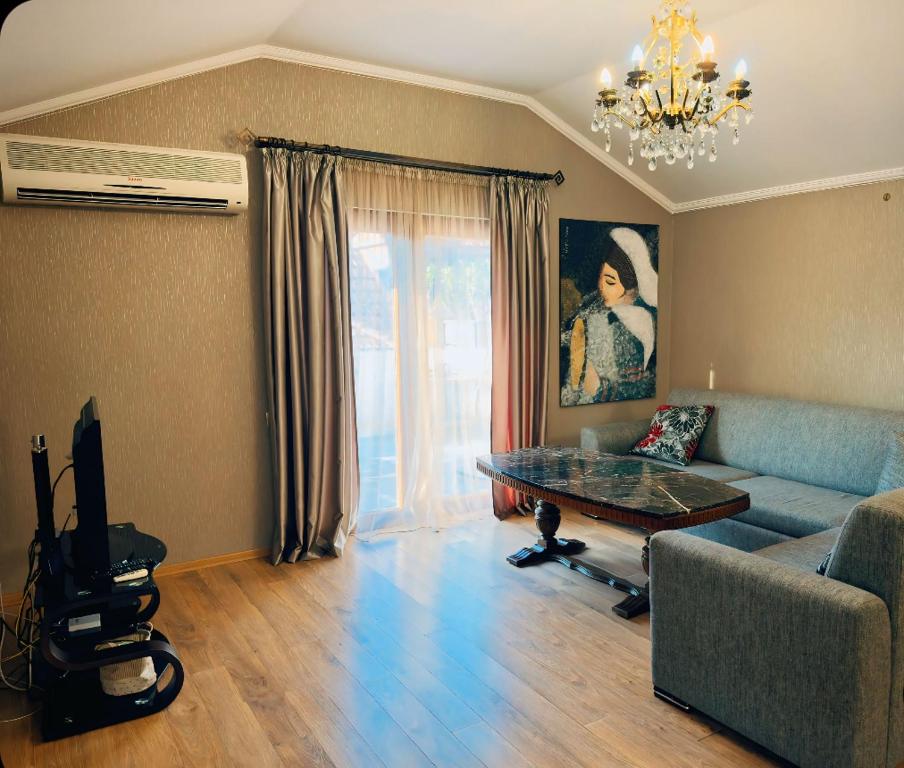 Posezení v ubytování Apartment Antiokia