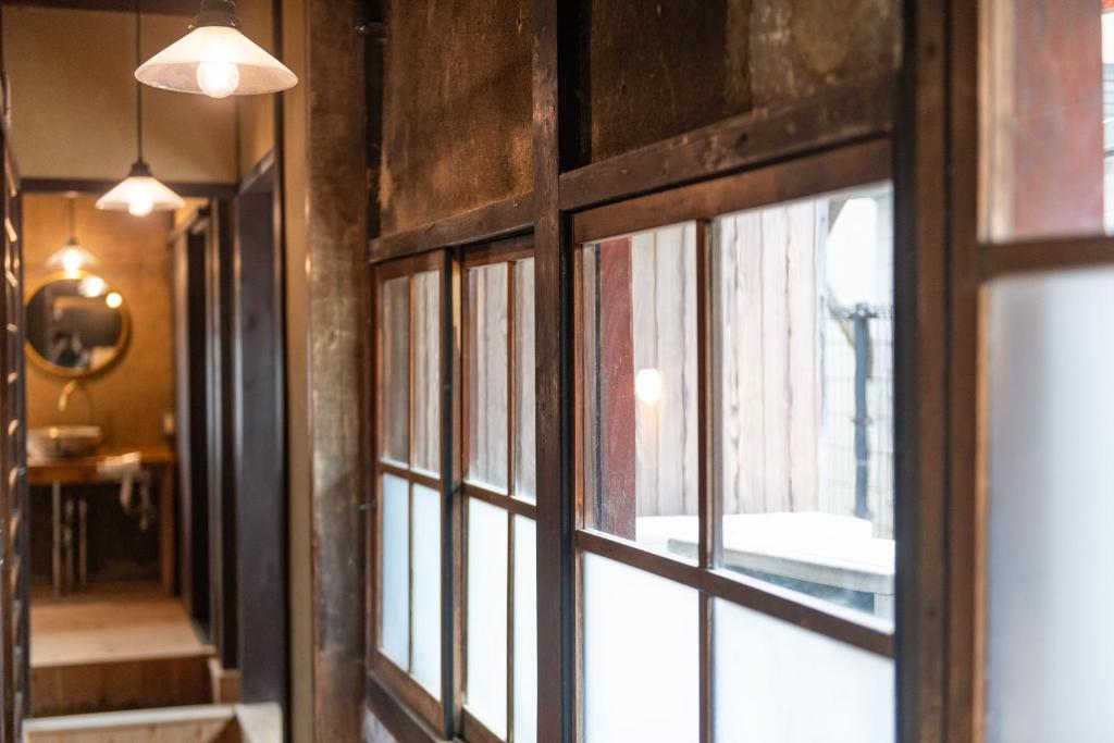 Fotografie z fotogalerie ubytování 篠山城下町ゲストハウス quolo v destinaci Tamba-sasayama