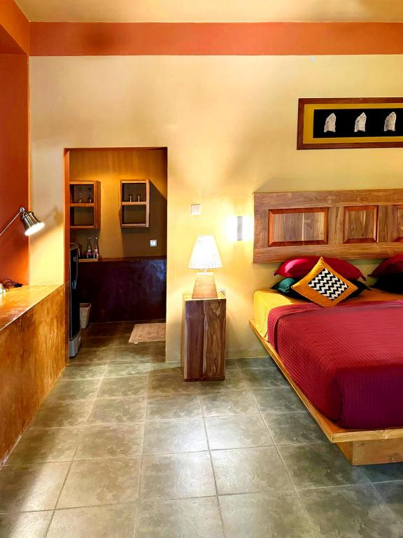 Postel nebo postele na pokoji v ubytování Art Yala Boutique Resort