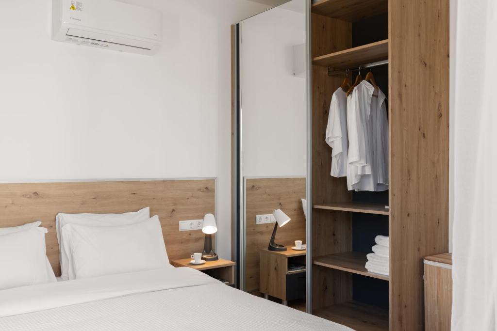 Postel nebo postele na pokoji v ubytování Sea Residence Complex