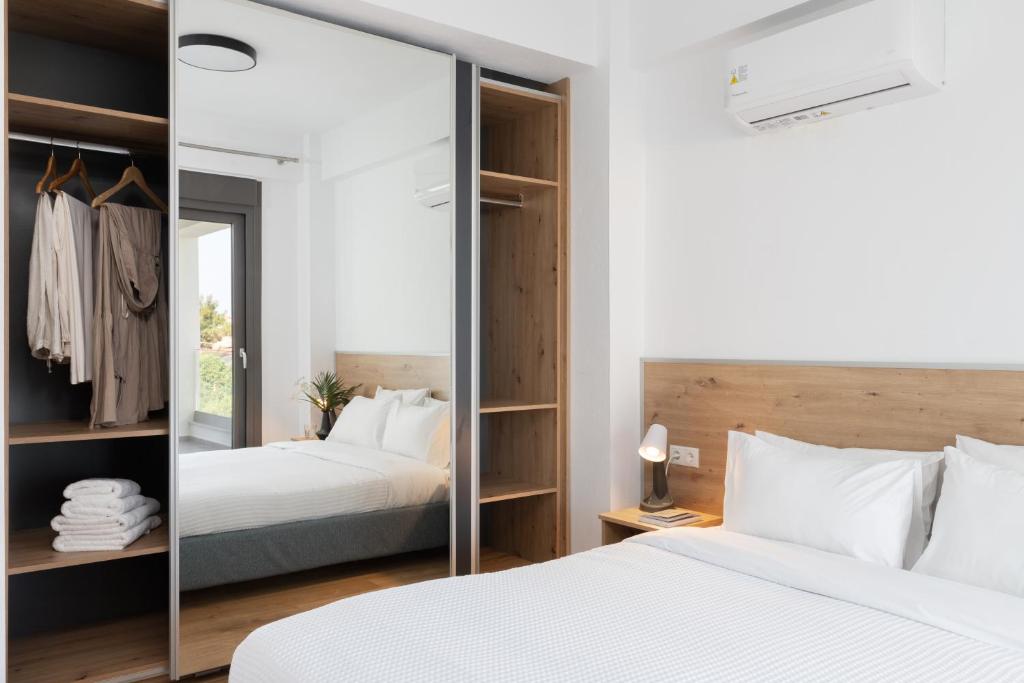 Postel nebo postele na pokoji v ubytování Sea Residence Complex