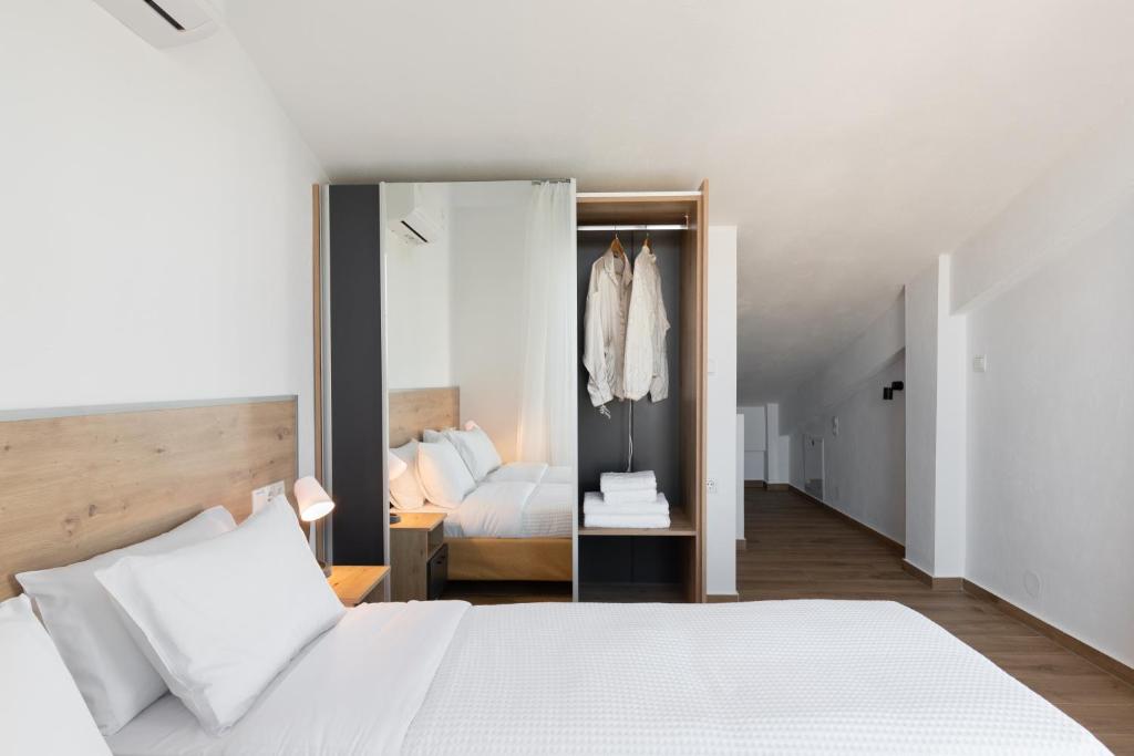 Postel nebo postele na pokoji v ubytování Sea Residence Complex