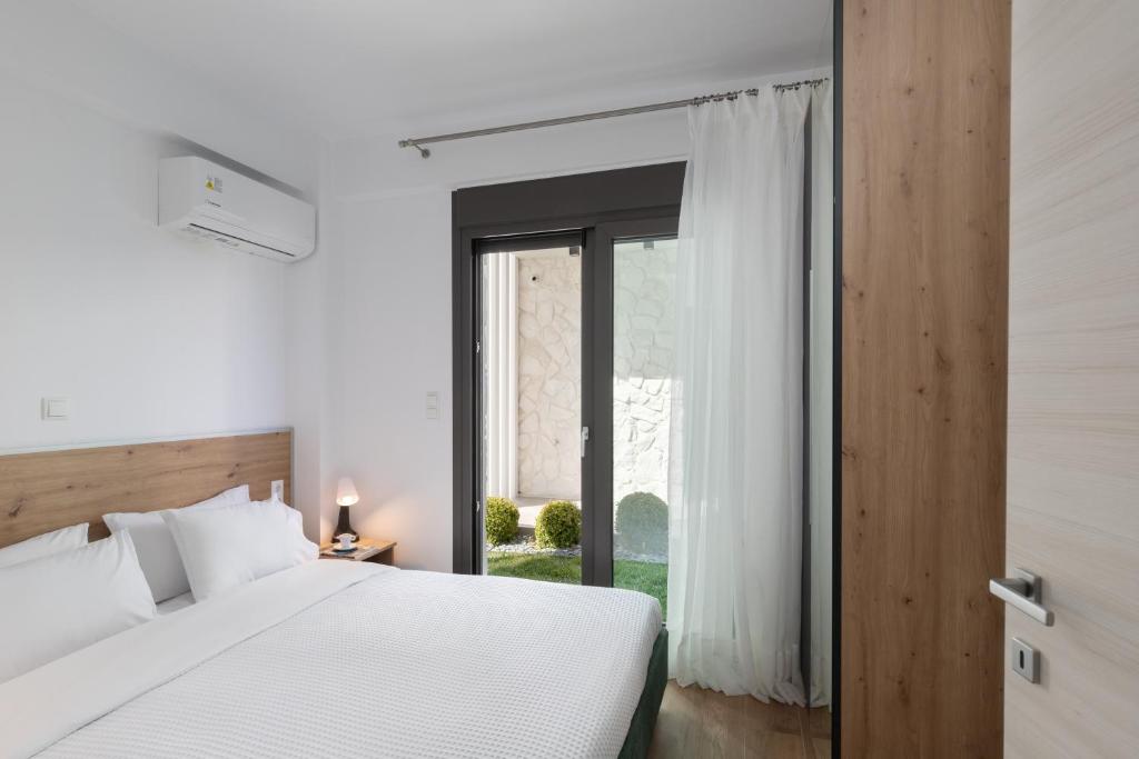 Postel nebo postele na pokoji v ubytování Sea Residence Complex